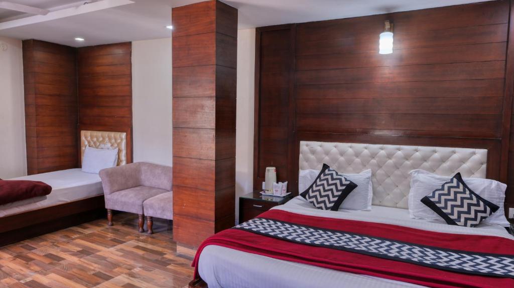 Voodi või voodid majutusasutuse Basera Hotel toas