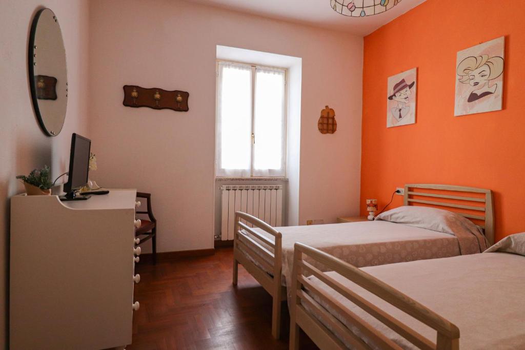 Postel nebo postele na pokoji v ubytování Margherita Guest House