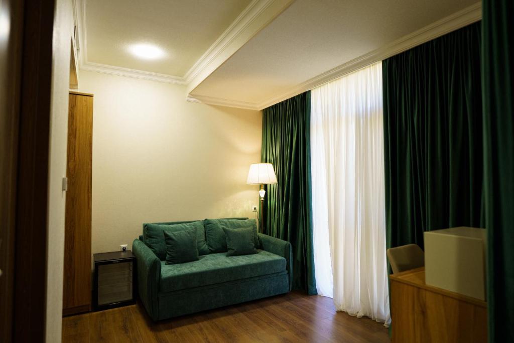 Posezení v ubytování Green Palace Kutaisi