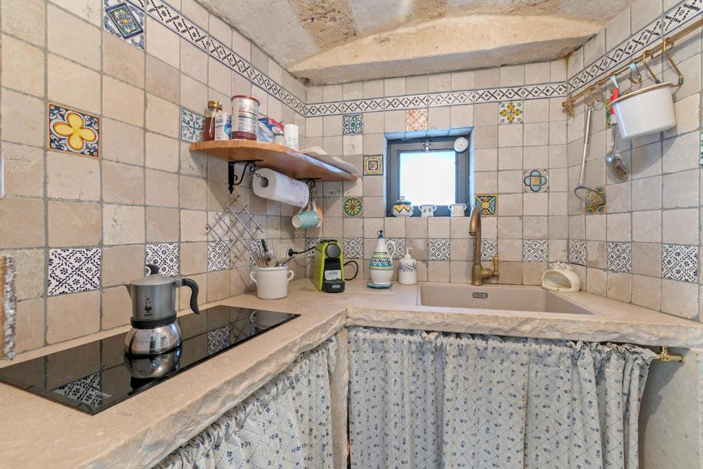 Kuchnia lub aneks kuchenny w obiekcie Masseria Antoglia Rooms