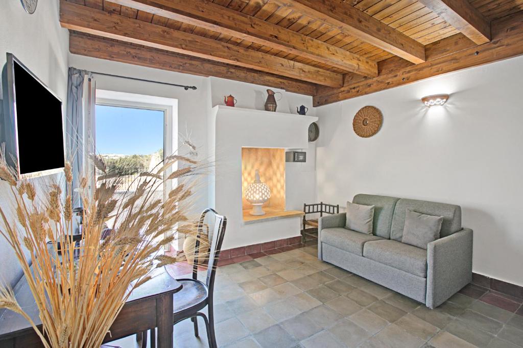 Telewizja i/lub zestaw kina domowego w obiekcie Masseria Antoglia Rooms
