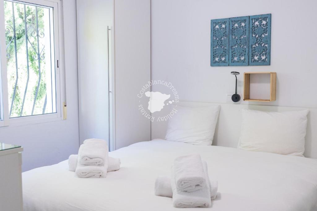 Postel nebo postele na pokoji v ubytování CostaBlancaDreams Casa Carrio in Calpe