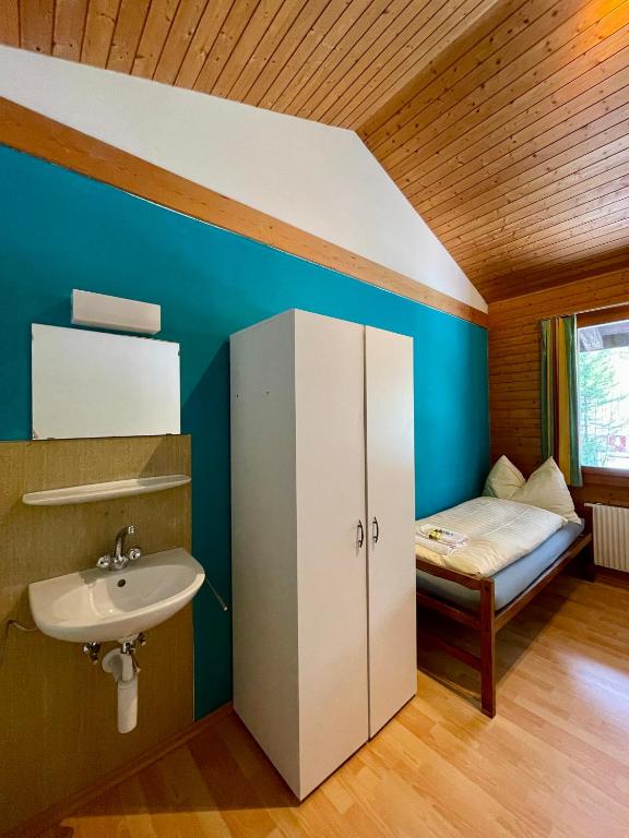 Postel nebo postele na pokoji v ubytování Alpine Base Hostel - Adults only