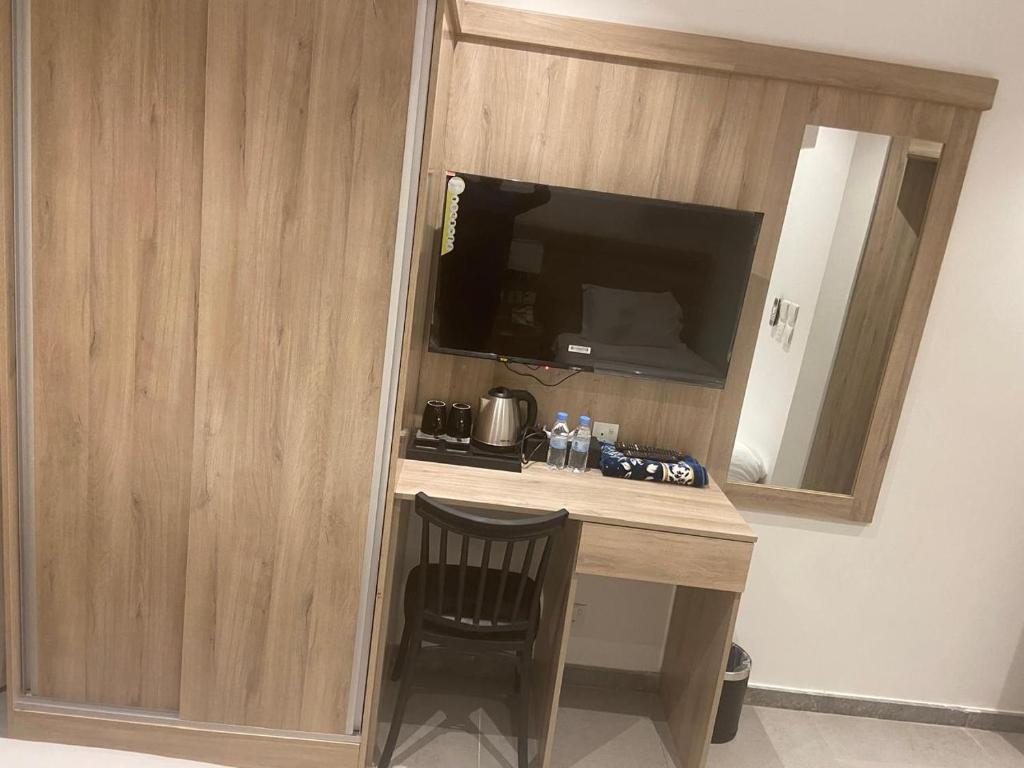 Kuchyň nebo kuchyňský kout v ubytování فندق اليسر الفضي ام القري