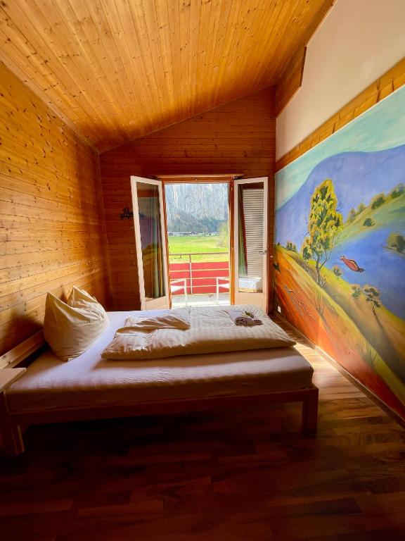 Postel nebo postele na pokoji v ubytování Alpine Base Hostel - Adults only