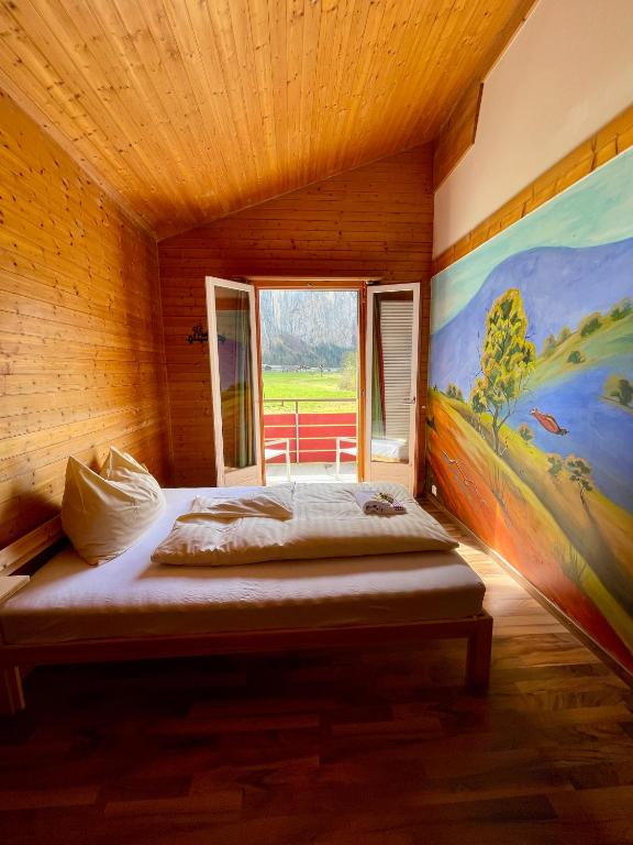 Postel nebo postele na pokoji v ubytování Alpine Base Hostel - Adults only