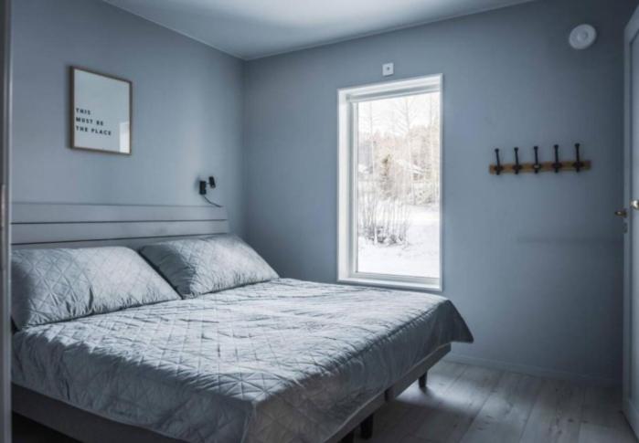 Postel nebo postele na pokoji v ubytování Bergsgården Lodge Järvsö - Ski In Ski Out med bastu invid Järvsöbacken - OBS!!! BYTESDAGAR ÄR ENDAST TORS O SÖND OBS!!!