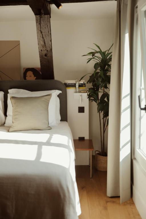 Postel nebo postele na pokoji v ubytování Aplace Antwerp - marvellous hotel rooms - Oude koornmarkt 1