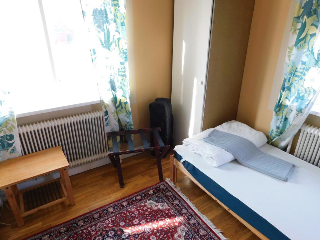 Postel nebo postele na pokoji v ubytování Vandrarhem Solgården
