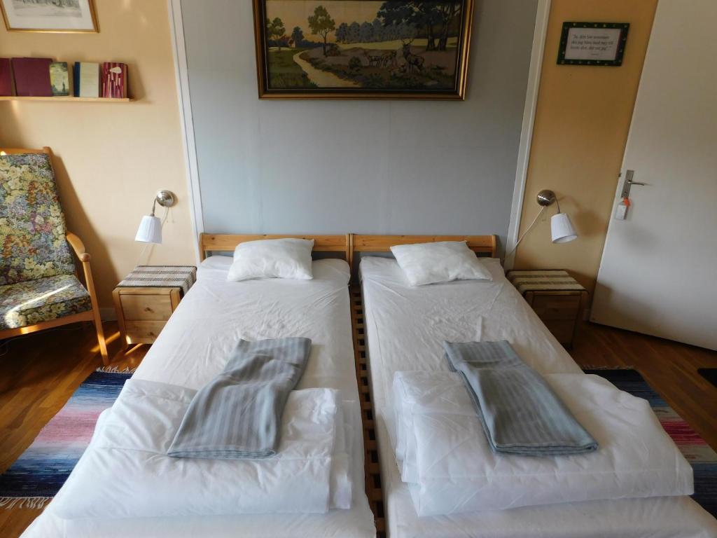 Postel nebo postele na pokoji v ubytování Vandrarhem Solgården