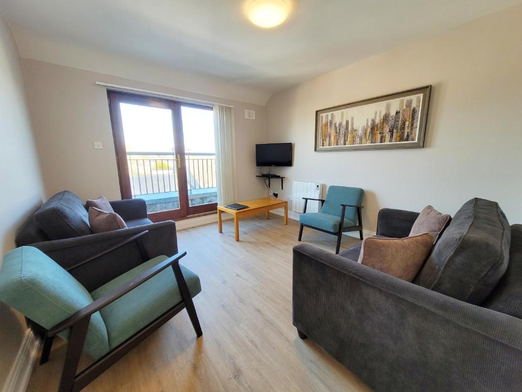 Posezení v ubytování Donegan Court Aparthotel