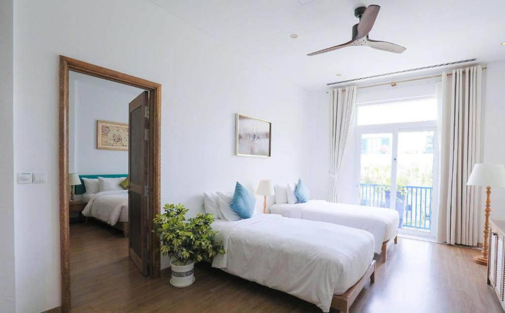 Suite Santorin Có Ban Công - Nhìn Ra Hồ Bơi/Thành Phố