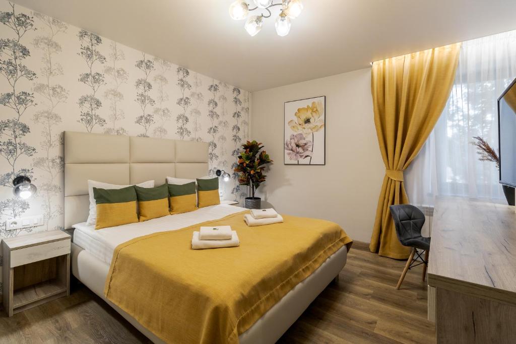 Posteľ alebo postele v izbe v ubytovaní DeMar Apart Sun