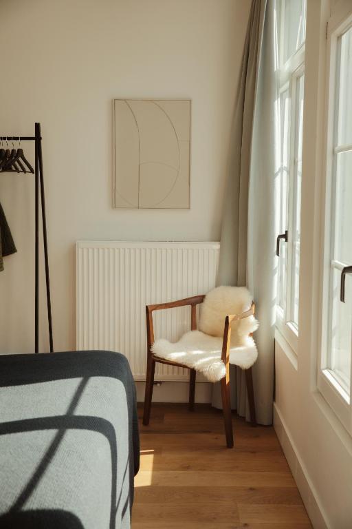 Postel nebo postele na pokoji v ubytování Aplace Antwerp - marvellous hotel rooms - Oude koornmarkt 1