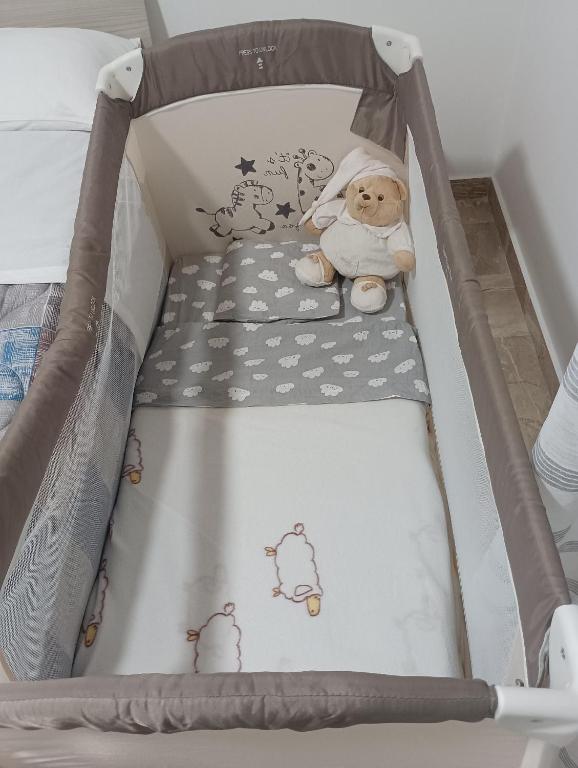 Postel nebo postele na pokoji v ubytování A casa di Elena e Francesco