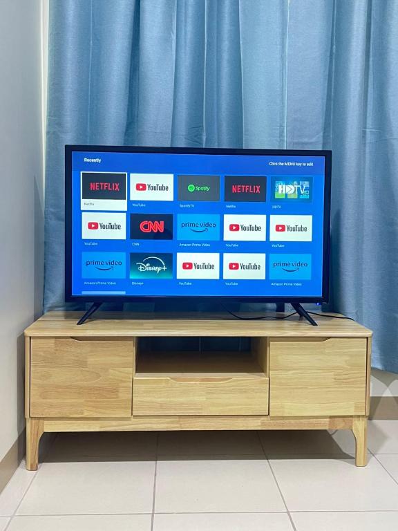 TV a/nebo společenská místnost v ubytování DH Suites