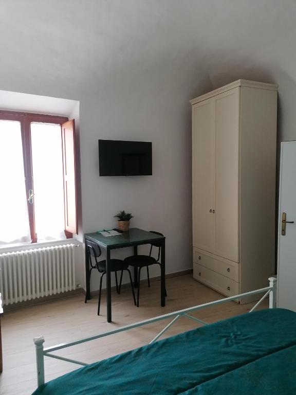TV a/nebo společenská místnost v ubytování Camera Botanica