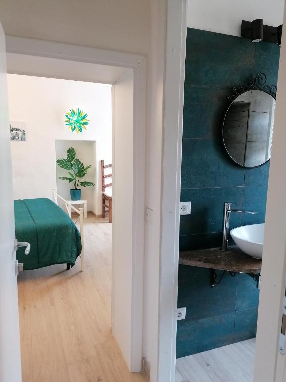 Postel nebo postele na pokoji v ubytování Camera Botanica