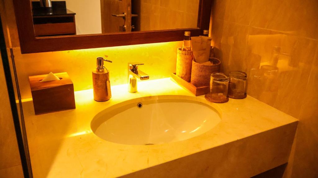 Koupelna v ubytování Kahayana Suites Ubud