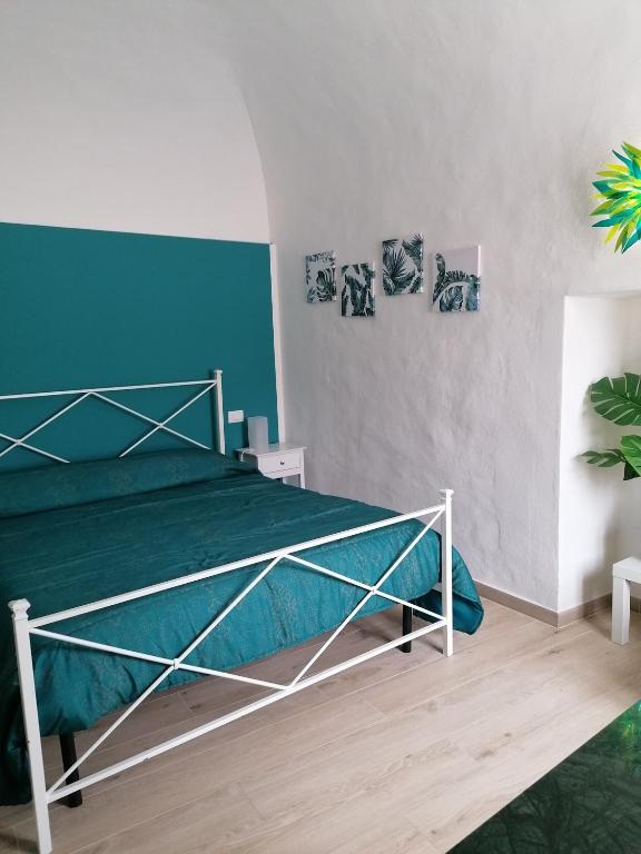 Postel nebo postele na pokoji v ubytování Camera Botanica