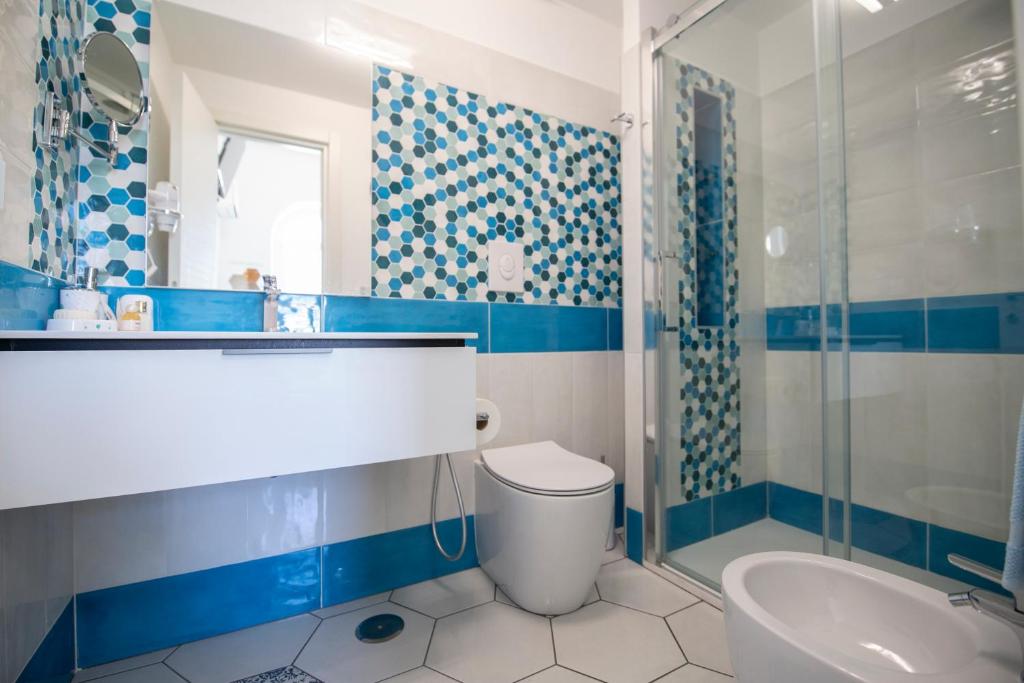 Koupelna v ubytování CAMERELLE LUXURY STAY