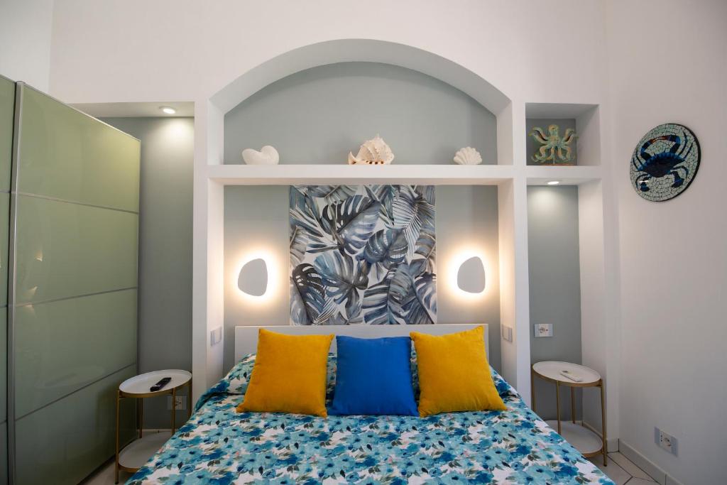 Postel nebo postele na pokoji v ubytování CAMERELLE LUXURY STAY