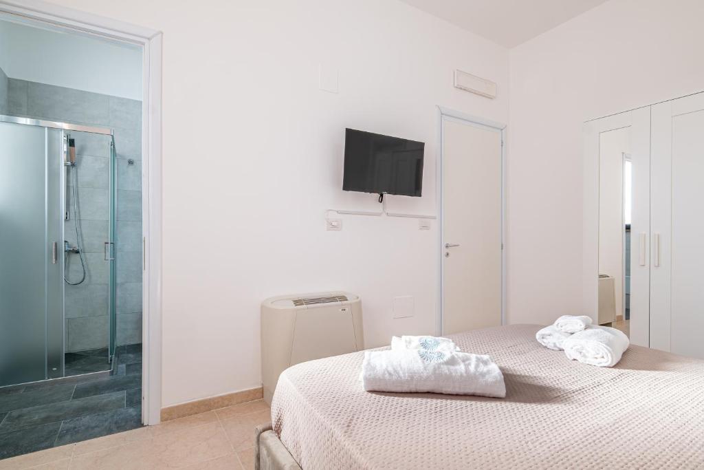 Postel nebo postele na pokoji v ubytování Deva Room