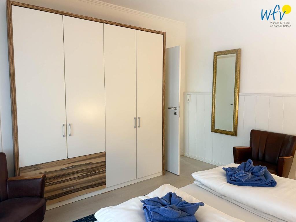 Postel nebo postele na pokoji v ubytování Villa Düna Ferienwohnung 5