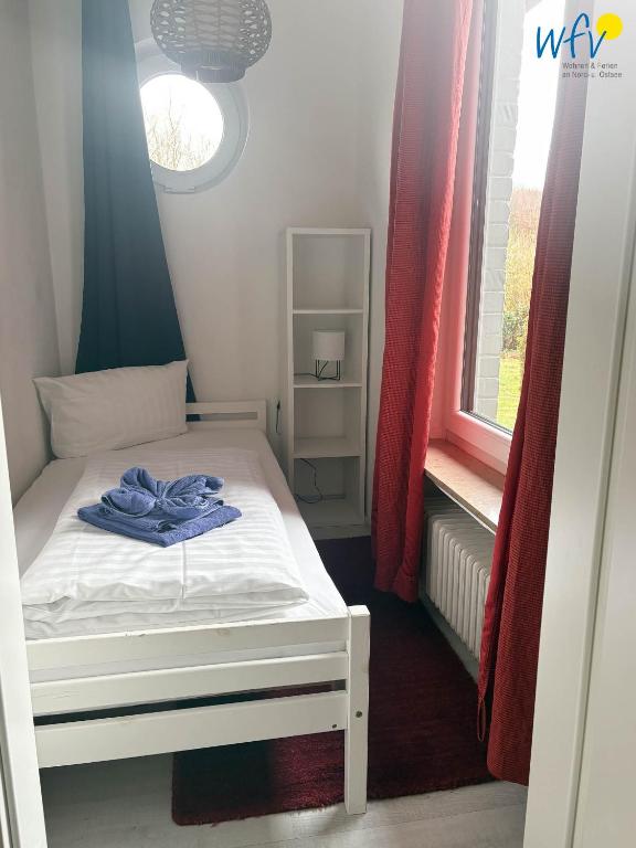Postel nebo postele na pokoji v ubytování Villa Düna Ferienwohnung 5