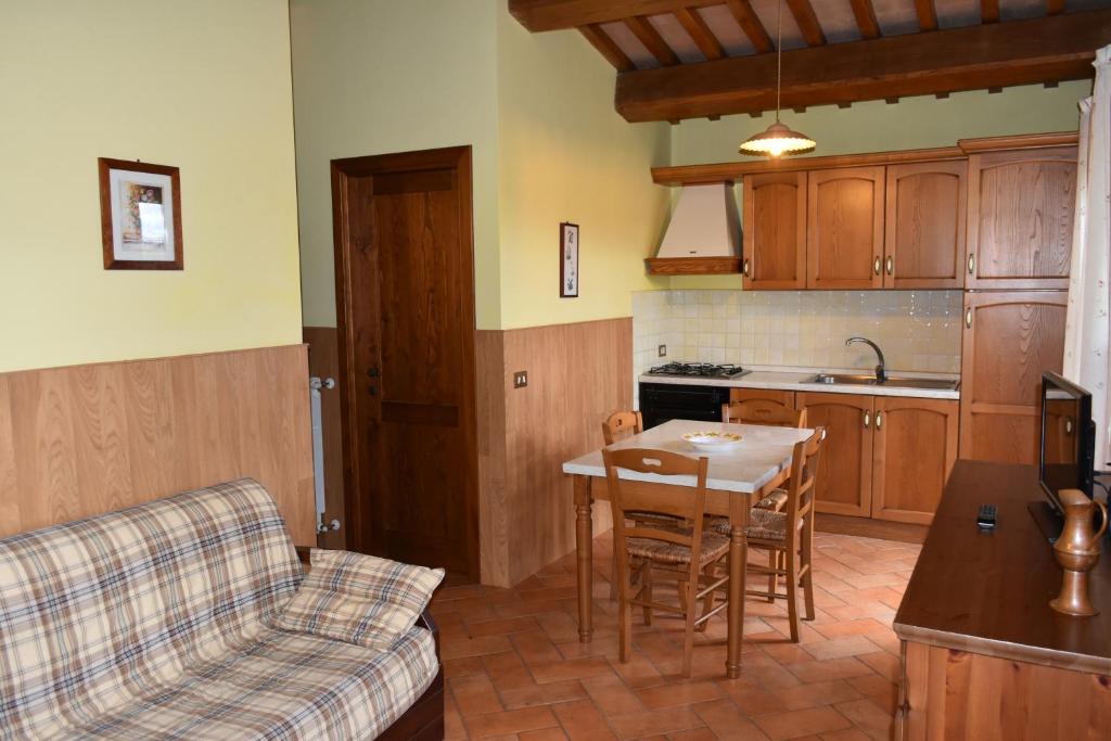 Kuchyň nebo kuchyňský kout v ubytování Agriturismo Le Ginestre