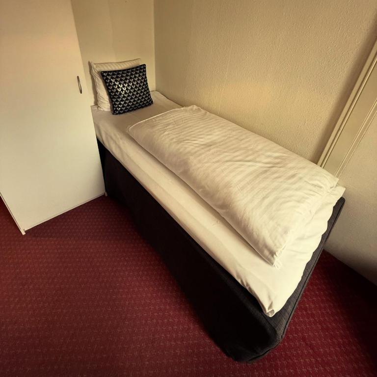 Postel nebo postele na pokoji v ubytování BUDGET HOTEL Viborg