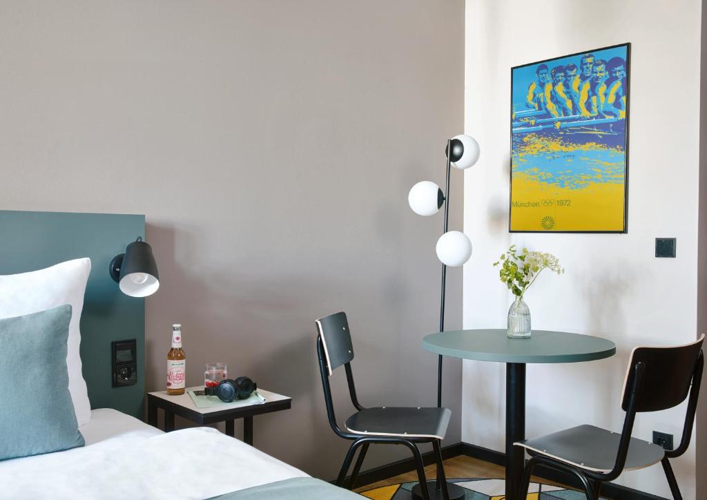 Postel nebo postele na pokoji v ubytování Living Hotel Kaiser Franz Joseph