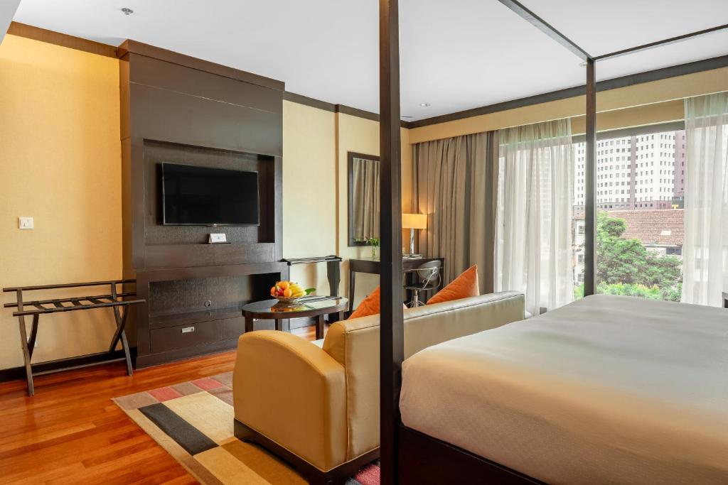 Postel nebo postele na pokoji v ubytování Micasa All Suites Hotel