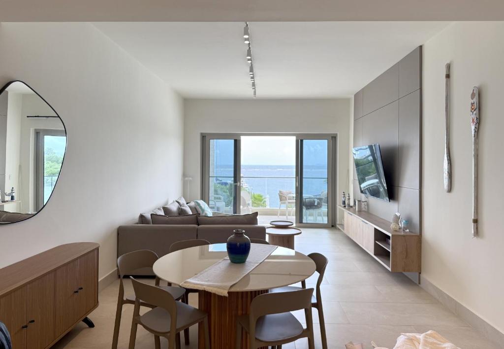TV a/nebo společenská místnost v ubytování AmazINN Places Playa Escondida