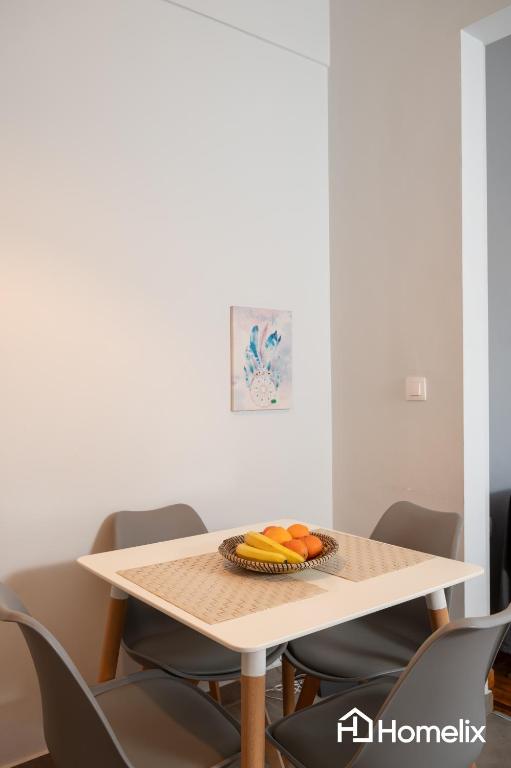 Posezení v ubytování 30m² Cosy studio with panoramic sea view