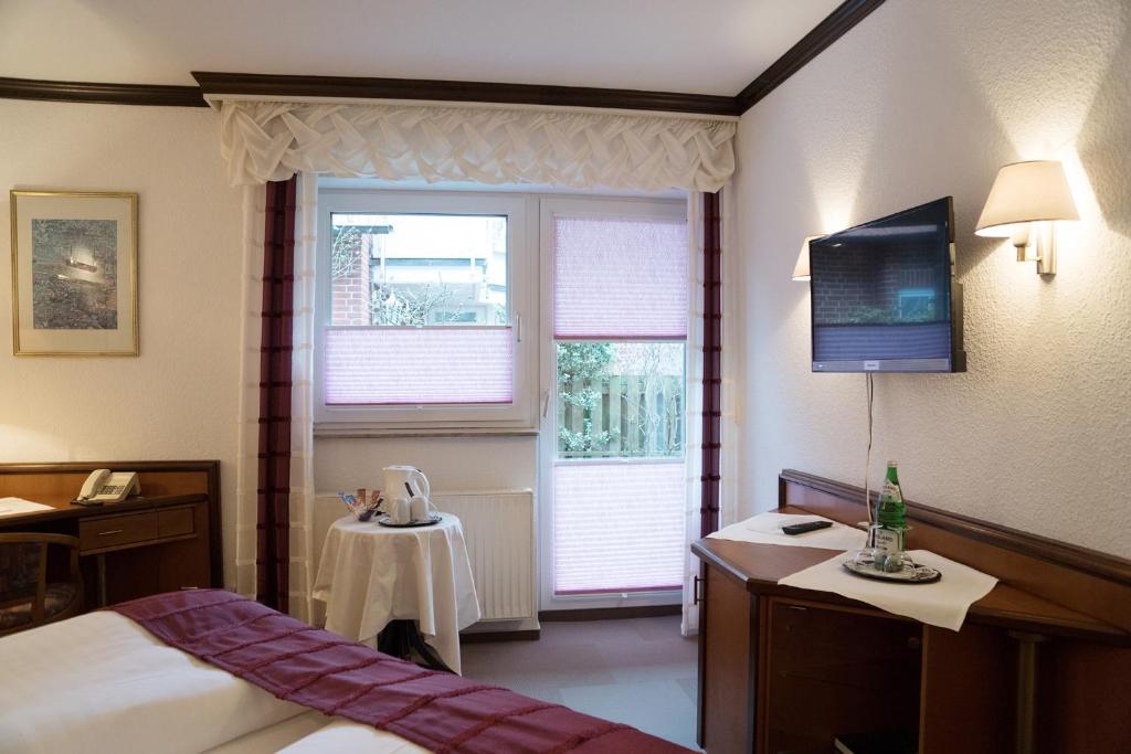Postel nebo postele na pokoji v ubytování Hotel Chalet