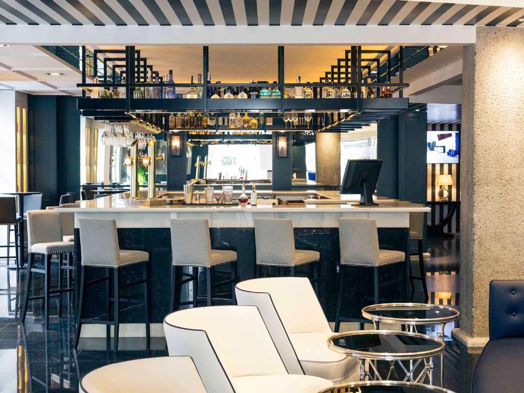 Posezení v ubytování Hotel Mercure Jardines de Albia