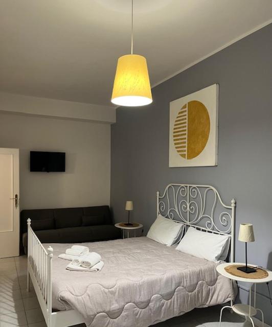Postel nebo postele na pokoji v ubytování B&B Le Comari Salentine