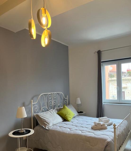 Postel nebo postele na pokoji v ubytování B&B Le Comari Salentine