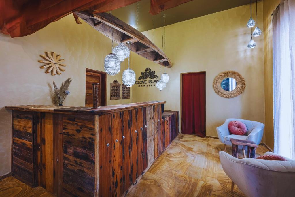 Postel nebo postele na pokoji v ubytování Clove Island Essence & Spa