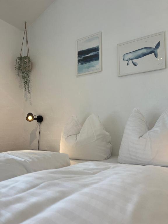 Voodi või voodid majutusasutuse Hartel House toas