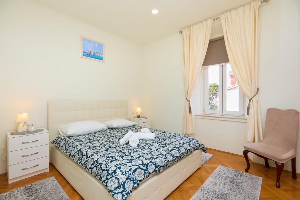 Postel nebo postele na pokoji v ubytování Spacious 4 Bedroom Dubrovnik Apartment