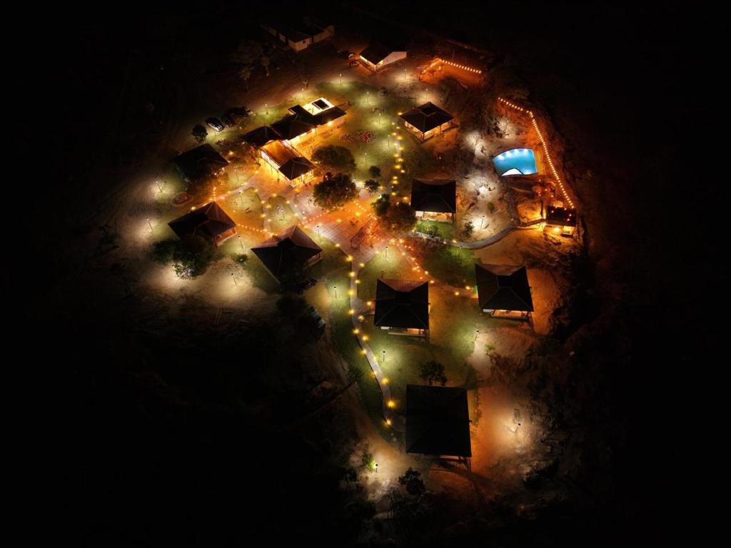 an aerial view of a building with lights at Nazareth Cânion in Buriti dos Montes