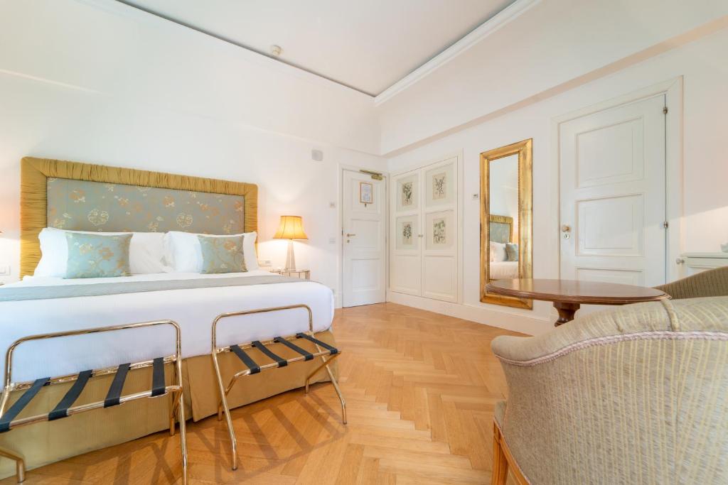 Кровать или кровати в номере Relais Villa San Martino