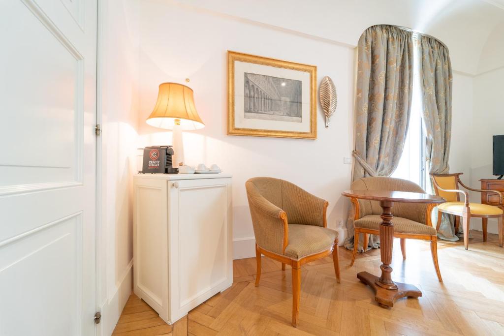 Телевизор и/или развлекательный центр в Relais Villa San Martino
