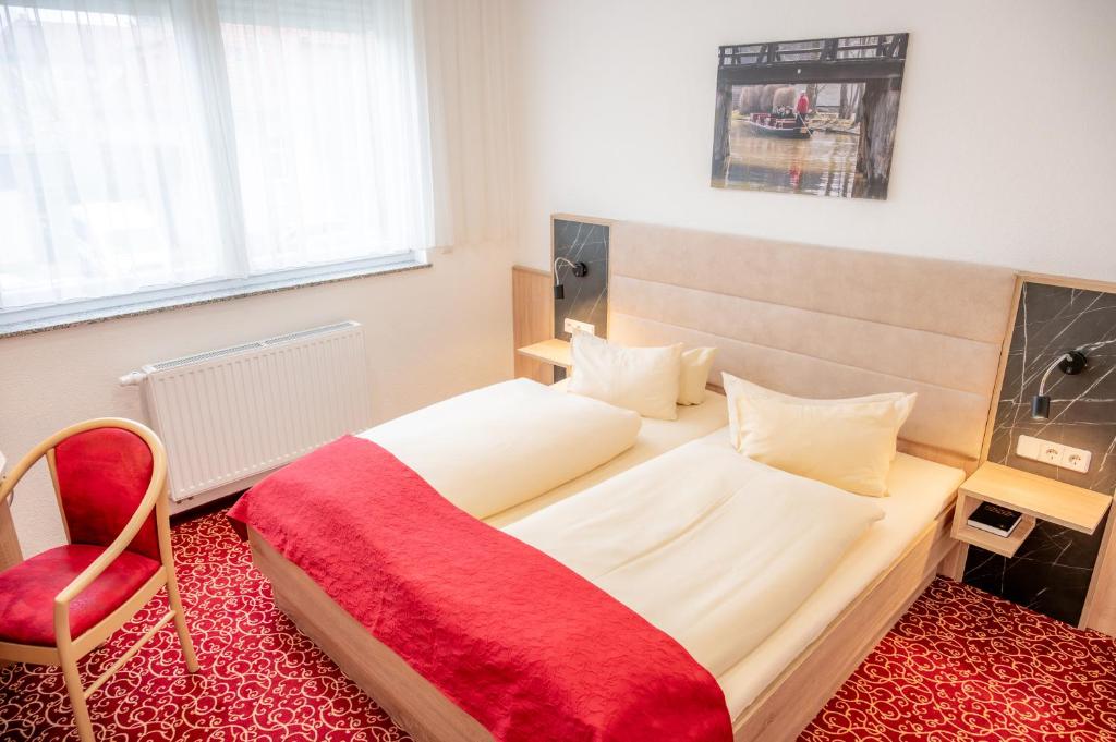 Postel nebo postele na pokoji v ubytování AaRa Hotel