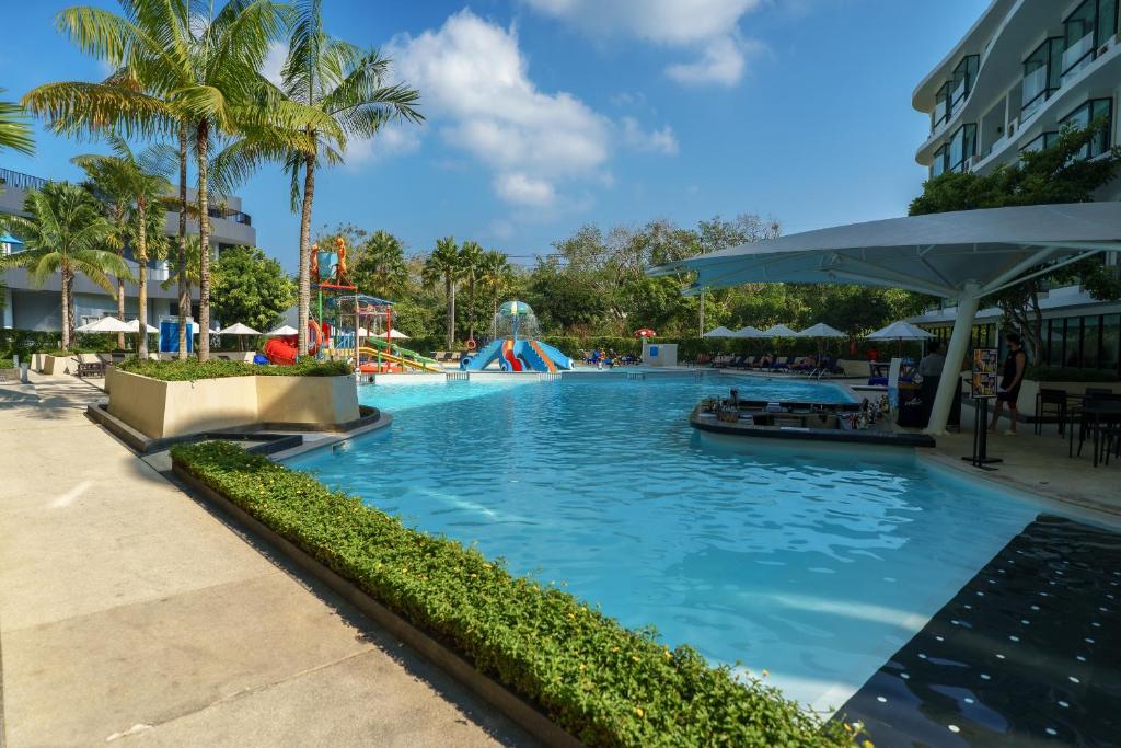 a pool at a resort with a water park at View 2Bdr Lux Life Rawai in Rawai Beach