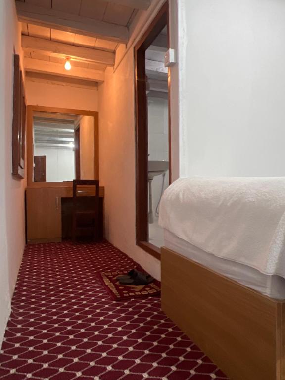 Letto o letti in una camera di Hotel Dancing Yak