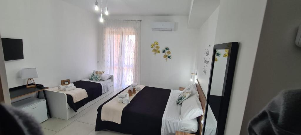 Letto o letti in una camera di Tropical House