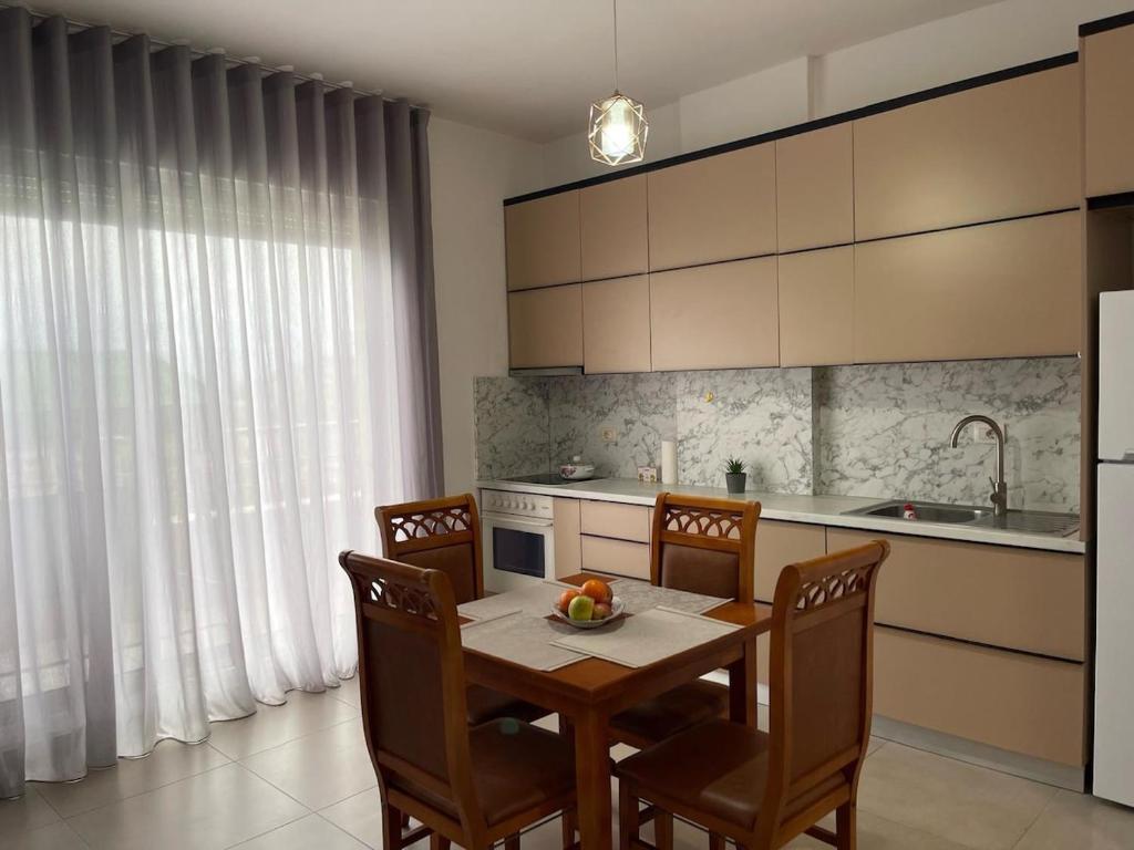 Kuchyň nebo kuchyňský kout v ubytování Liqeni i thate apartment